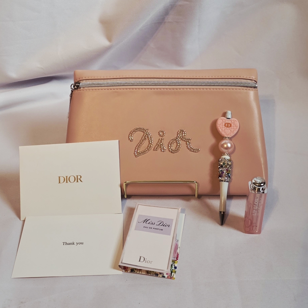 Dior Pink Clutch Stuffed with Dior Accessories